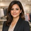 Professional headshot of Emma Rodriguez, Retail Manager